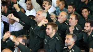 Members of the Iranian revolutionary guards shout anti-Israeli and anti-US slogans during the weekly Friday prayers at Tehran University in the Iranian capital on July 16, 2010. AFP PHOTO/ATTA KENARE (Photo credit should read ATTA KENARE/AFP/Getty Images)