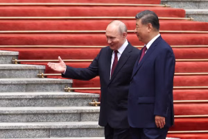 Xi Hosts Putin in Beijing Days After Trump Visit