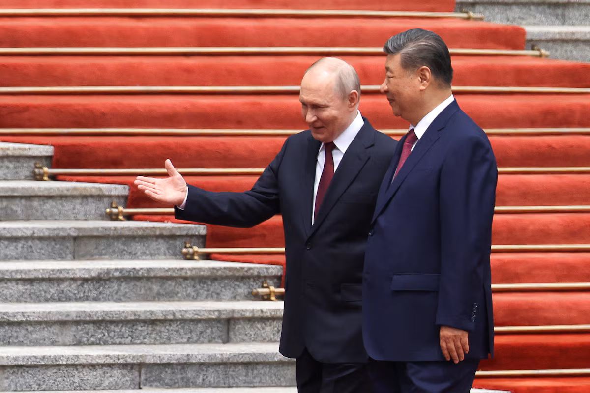 Xi Hosts Putin in Beijing Days After Trump Visit